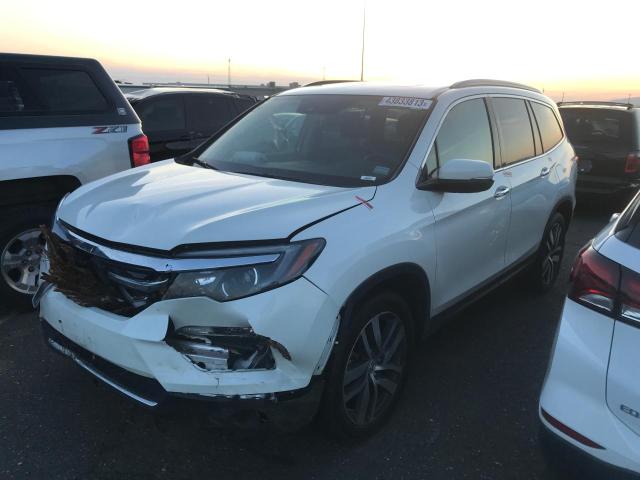 Photo 1 from auction – 2017 HONDA PILOT TOUR with VIN 5FNYF6H96HB082675