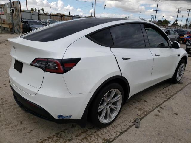 Photo 3 from auction – 2021 TESLA MODEL Y with VIN 5YJYGDEE2MF218412