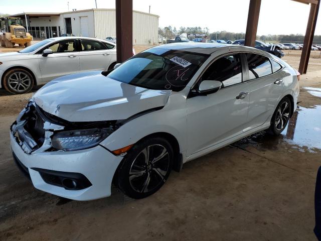 HONDA CIVIC TOUR 2016 with VIN 19XFC1F96GE036631 - Photo from auction