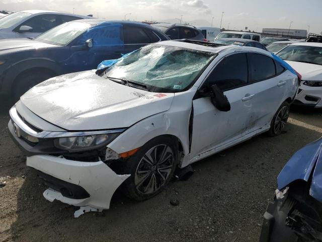 HONDA CIVIC EX 2016 with VIN 2HGFC1F3XGH656125 - Photo from auction