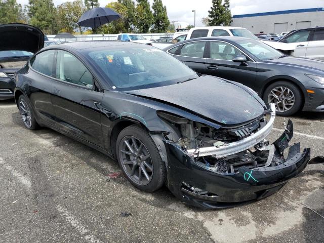 Photo 4 from auction – 2022 TESLA MODEL 3 with VIN 5YJ3E1EA3NF290457