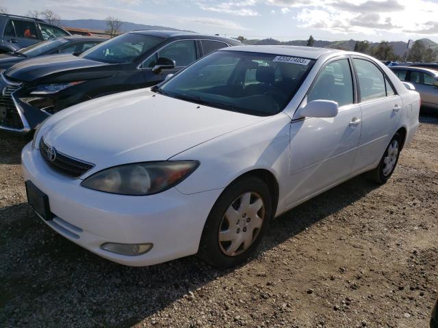 TOYOTA CAMRY LE 2004 with VIN JTDBE32K040277649 - Photo from auction