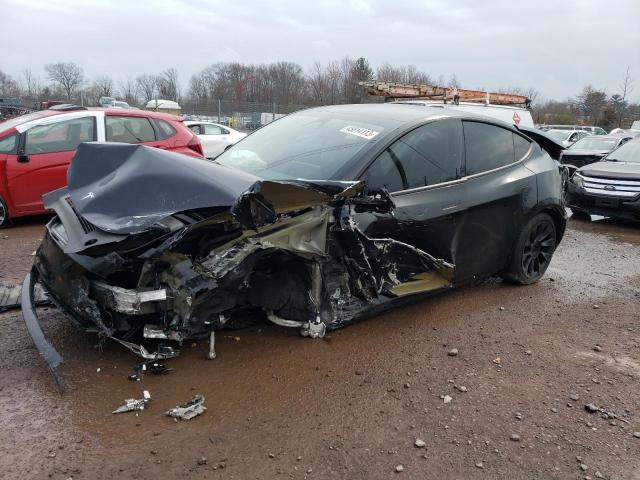 TESLA MODEL Y 2022 with VIN 7SAYGDEE7NF356161 - Photo from auction