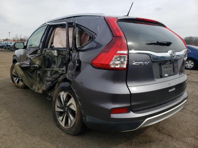 Photo 2 from auction – 2015 HONDA CR-V TOURI with VIN 5J6RM4H95FL127074