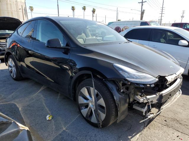 Photo 4 from auction – 2023 TESLA MODEL Y with VIN 7SAYGDEEXPA026093