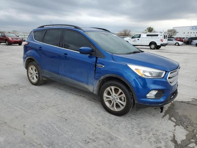 Photo 4 from auction – 2018 FORD ESCAPE SE with VIN 1FMCU0GD9JUC18910