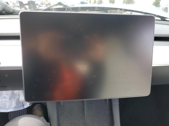 Photo 9 from auction – 2021 TESLA MODEL Y with VIN 5YJYGDED2MF210690