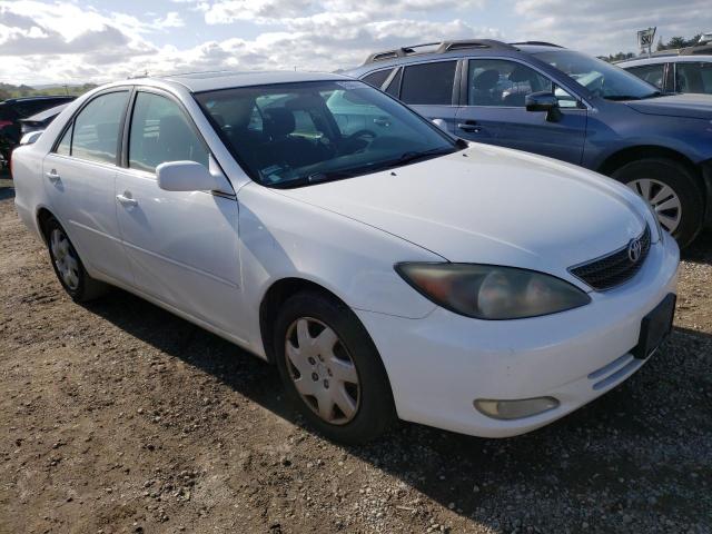 Photo 4 from auction – 2004 TOYOTA CAMRY LE with VIN JTDBE32K040277649