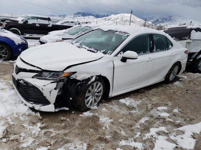 TOYOTA CAMRY LE 2020 with VIN 4T1C11AK2LU345717 - Photo from auction