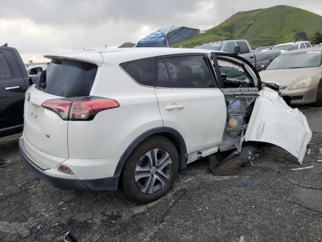 Photo 3 from auction – 2018 TOYOTA RAV4 LE with VIN JTMZFREV3JJ211462