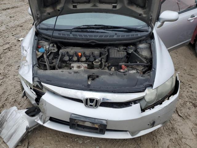 Photo 11 from auction – 2011 HONDA CIVIC LX with VIN 19XFA1F51BE038413