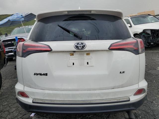 Photo 6 from auction – 2018 TOYOTA RAV4 LE with VIN JTMZFREV3JJ211462