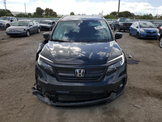 Photo 5 from auction – 2022 HONDA PILOT SE with VIN 5FNYF6H28NB094521
