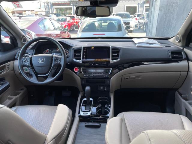 Photo 9 from auction – 2019 HONDA RIDGELINE with VIN 5FPYK3F73KB014019