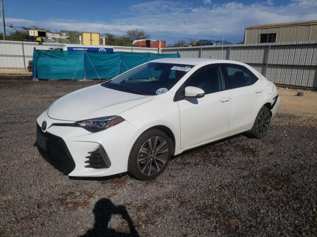 TOYOTA COROLLA L 2019 with VIN 5YFBURHE7KP909072 - Photo from auction