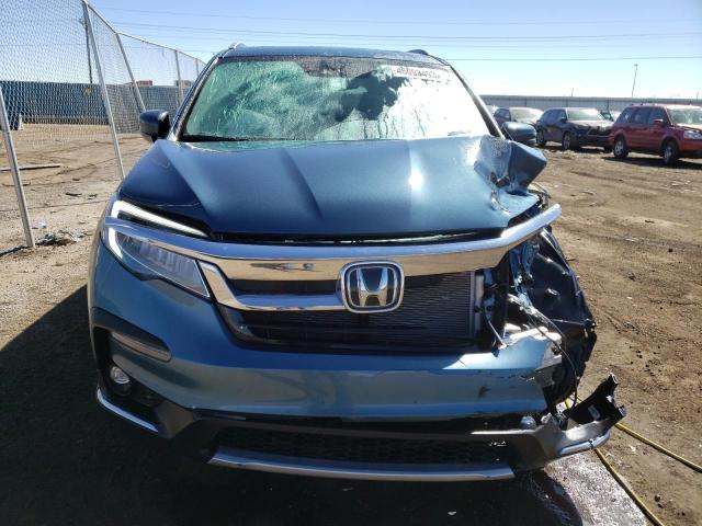 Photo 5 from auction – 2021 HONDA PILOT TOUR with VIN 5FNYF5H66MB018579