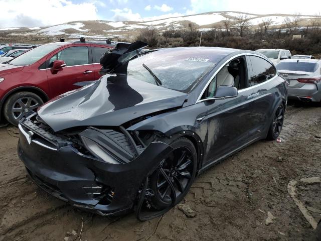 TESLA MODEL X 2017 with VIN 5YJXCBE20HF054066 - Photo from auction