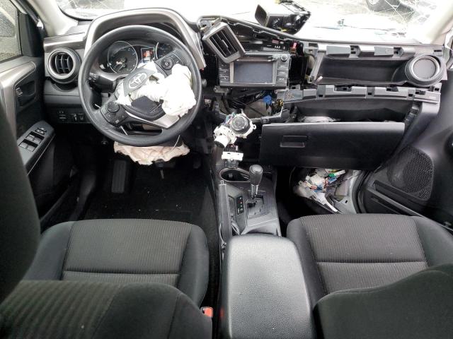 Photo 8 from auction – 2018 TOYOTA RAV4 LE with VIN JTMZFREV3JJ211462
