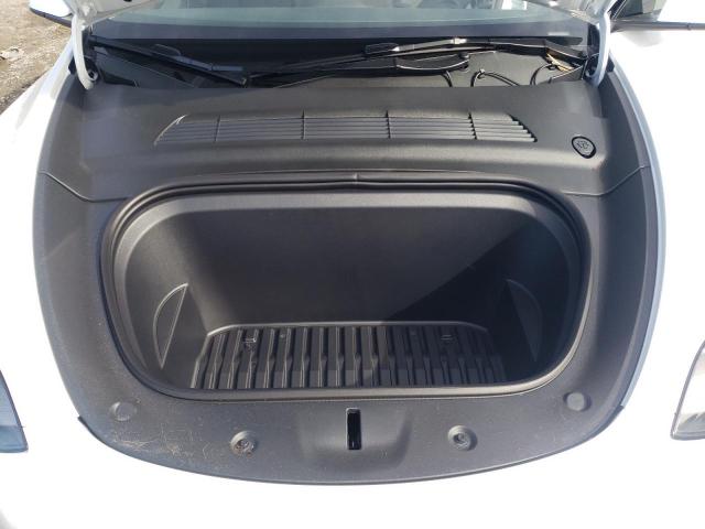 Photo 11 from auction – 2023 TESLA MODEL Y with VIN 7SAYGDEE5PF694256