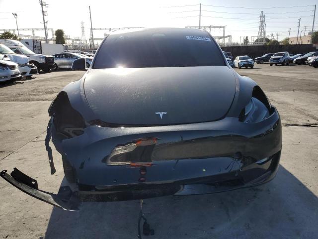 Photo 5 from auction – 2022 TESLA MODEL Y with VIN 7SAYGDEF3NF548945