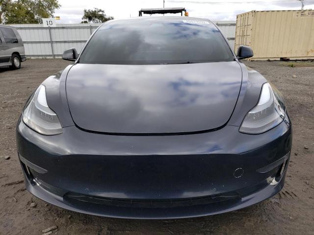 Photo 5 from auction – 2022 TESLA MODEL 3 with VIN 5YJ3E1EA3NF148433