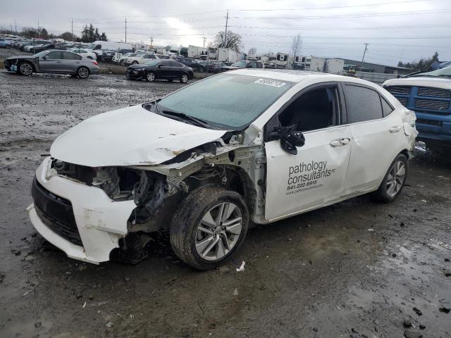 TOYOTA COROLLA EC 2014 with VIN 5YFBPRHE4EP101712 - Photo from auction