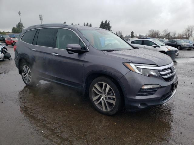 Photo 4 from auction – 2018 HONDA PILOT TOUR with VIN 5FNYF6H95JB009478