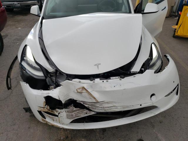 Photo 11 from auction – 2022 TESLA MODEL Y with VIN 7SAYGDEE5NF348964