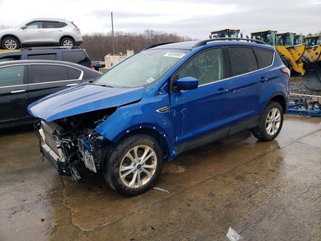 FORD ESCAPE SE 2018 with VIN 1FMCU9GD9JUD12063 - Photo from auction