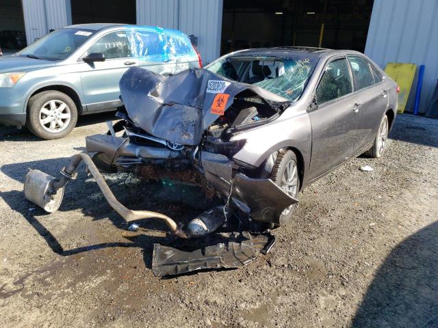 TOYOTA CAMRY LE 2016 with VIN 4T1BF1FK9GU613206 - Photo from auction