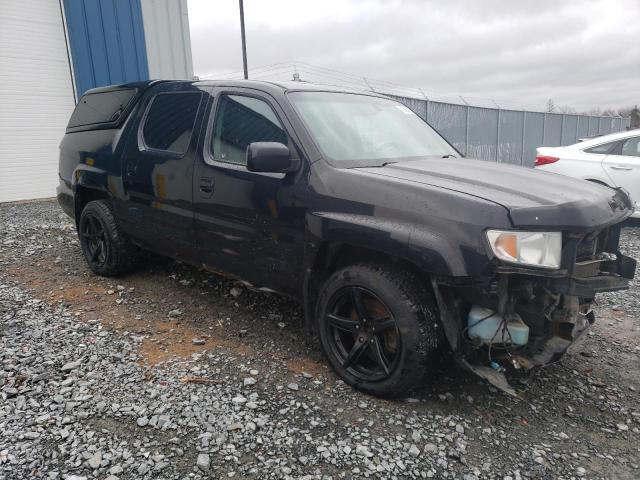 Photo 4 from auction – 2010 HONDA RIDGELINE with VIN 5FPYK1F59AB501694
