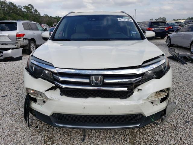 Photo 5 from auction – 2017 HONDA PILOT ELIT with VIN 5FNYF6H05HB061687