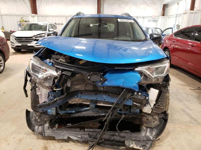 Photo 5 from auction – 2017 TOYOTA RAV4 LE with VIN JTMBFREV0HJ123030