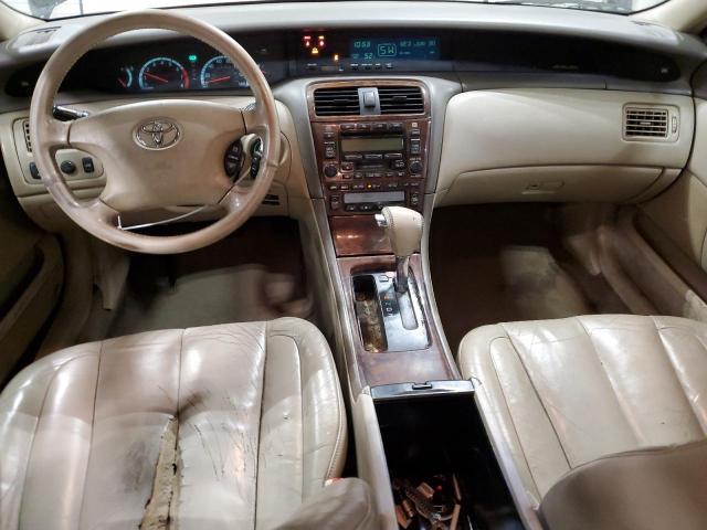 Photo 8 from auction – 2002 TOYOTA AVALON XL with VIN 4T1BF28B52U244128