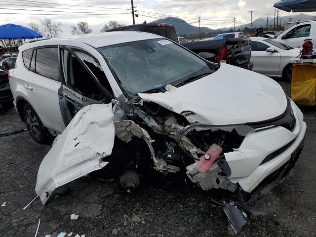 Photo 4 from auction – 2018 TOYOTA RAV4 LE with VIN JTMZFREV3JJ211462