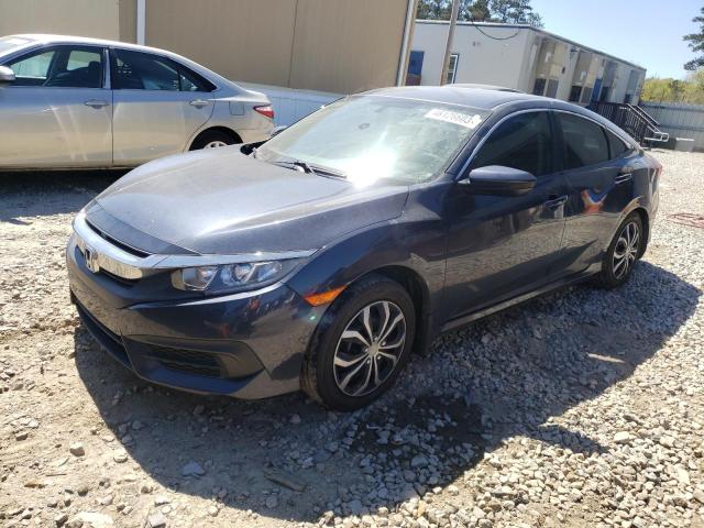 HONDA CIVIC LX 2018 with VIN 19XFC2F54JE014895 - Photo from auction