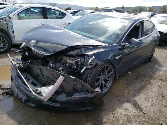 TESLA MODEL 3 2018 with VIN 5YJ3E1EB9JF084711 - Photo from auction