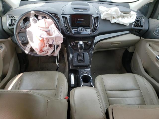 Photo 8 from auction – 2014 FORD ESCAPE TIT with VIN 1FMCU9J90EUD18943