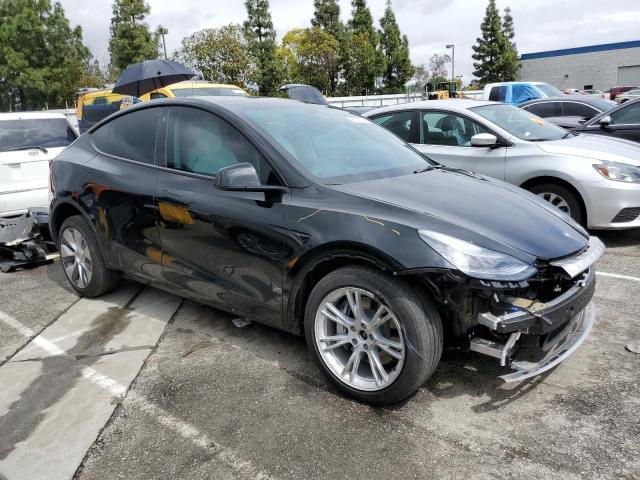 Photo 4 from auction – 2021 TESLA MODEL Y with VIN 5YJYGDEE4MF152560