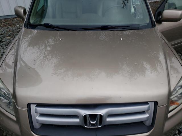Photo 12 from auction – 2006 HONDA PILOT EX with VIN 2HKYF18526H528111