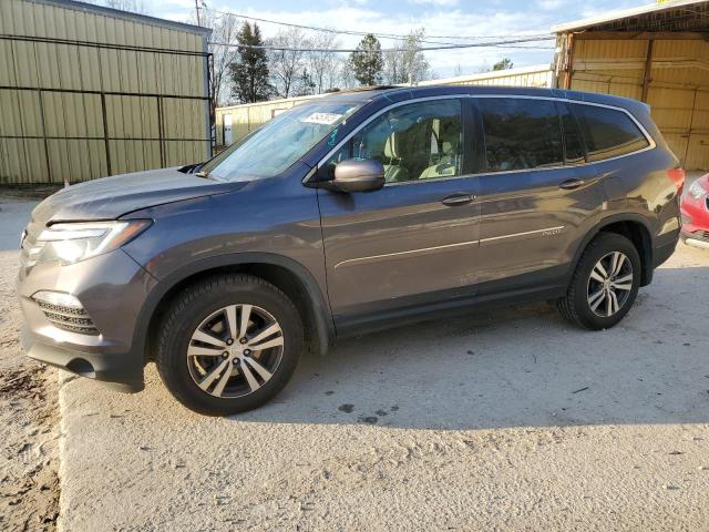 HONDA PILOT EXL 2018 with VIN 5FNYF6H8XJB047490 - Photo from auction