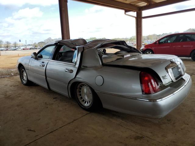 Photo 2 from auction – 2000 LINCOLN TOWN CAR E with VIN 1LNHM81W5YY890724