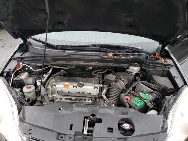 Photo 11 from auction – 2011 HONDA CR-V SE with VIN JHLRE4H46BC027599