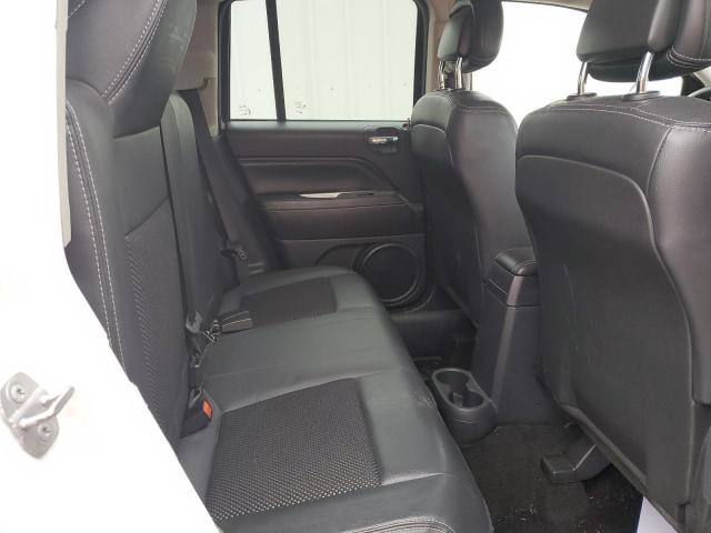 Photo 11 from auction – 2014 JEEP COMPASS LA with VIN 1C4NJDEB1ED810564
