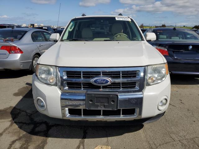 Photo 5 from auction – 2011 FORD ESCAPE with VIN 1FMCU0EG2BKA09292