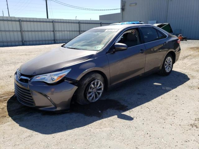 TOYOTA CAMRY LE 2017 with VIN 4T1BF1FK4HU667160 - Photo from auction