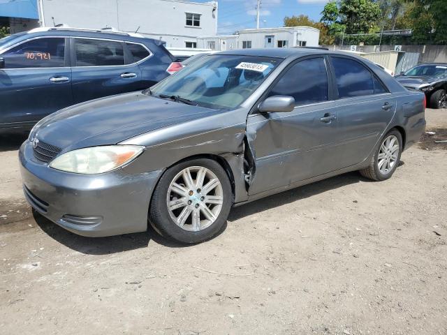 TOYOTA CAMRY LE 2002 with VIN 4T1BE32K32U588414 - Photo from auction