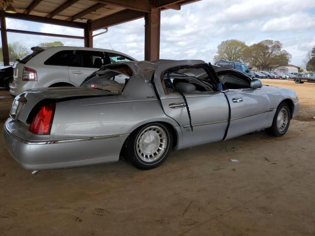 Photo 3 from auction – 2000 LINCOLN TOWN CAR E with VIN 1LNHM81W5YY890724