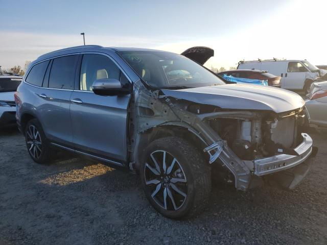 Photo 4 from auction – 2022 HONDA PILOT TOUR with VIN 5FNYF5H92NB000625