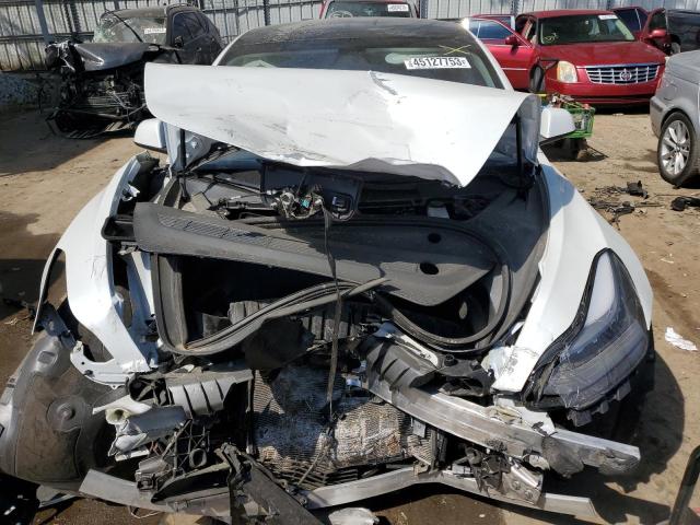 Photo 11 from auction – 2022 TESLA MODEL 3 with VIN 5YJ3E1EB3NF105509